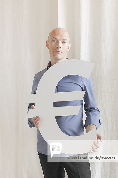 Portrait,Geschäftsmann,Symbol,halten,Büro,Hoffnung,Euro
