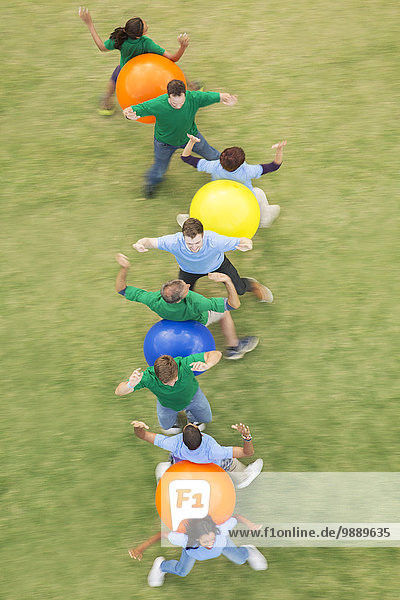 Teamwork,Aktivitäten,Sport,Gebäude,zeigen,Ball Spielzeug