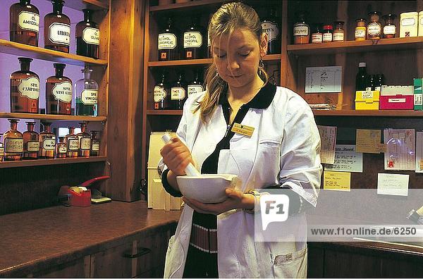Female pharmacist's assistant working in lab  Germany