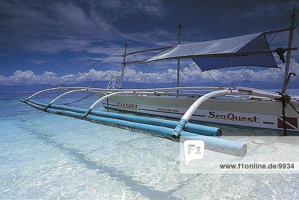 Catamaran in shallow waters of the sea  Philippines