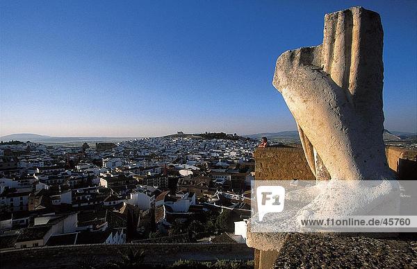 Old ruins of statue overlooking city  Antequera  Arco de Gigantes  Andalusia  Spain