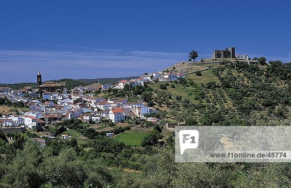 High angle view of houses on hill  Cortegana  Sierra de Aracena  Andalusia  Spain