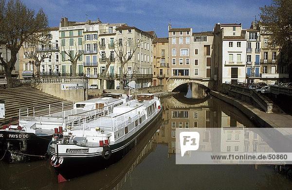 Tour boats in canal  Canal de la Robine  Pont des Merchands  Narbonne  France