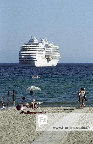 Cruise ship moored near beach  Giardini Naxos  Sicily  Italy
