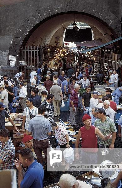 People at market  Catania  Sicily  Italy