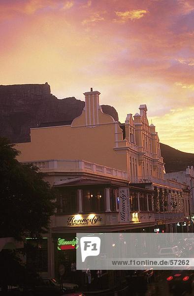 Buildings along street at dusk  Long Street  Cape Town  Table Mountain  Western Cape Province  South Africa