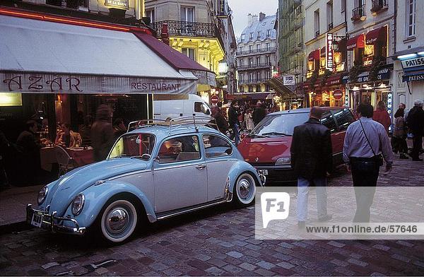 Cars and tourists in street  Paris  France