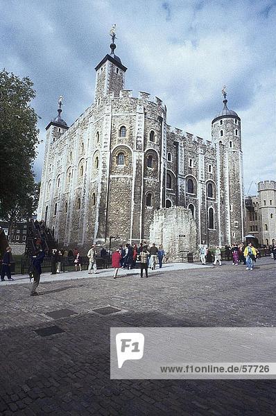 Tourists in front of historical building  The White Tower  Tower of London  London  England