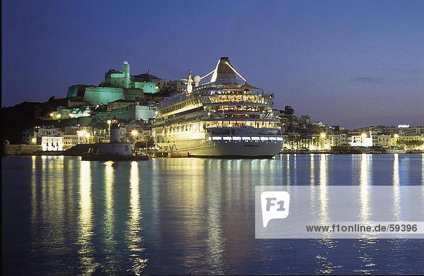 Cruise ship lit up at dusk  Ibiza Island  Spain