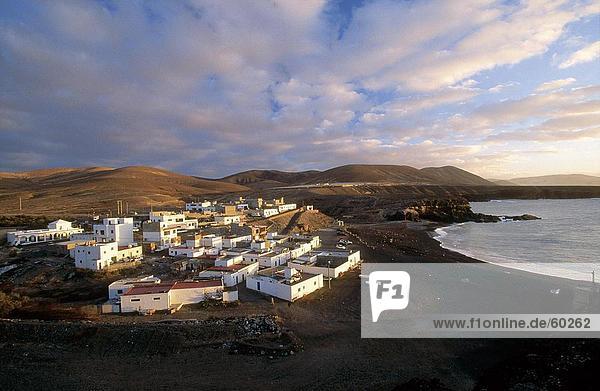 High angle view of a town on the coast  Playa De Los Muertos  Ajuy  Fuerteventura  Canary Islands  Spain