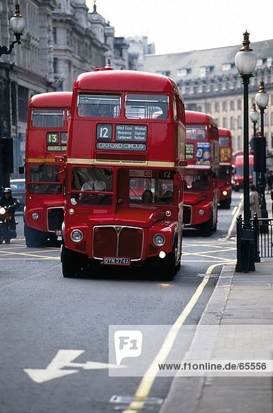 Double-decker buses on road