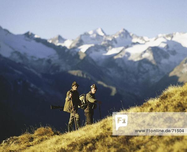 10072524  mountains  Austria  Europe  hunt  mountains  alpine  Alps  Tyrol  two  hunter  rifleman