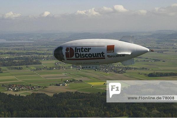 10650171  Felder  fliegen  Fujifilm  Interdiscount  Landschaft  Luftaufnahme  Luftaufnahme  Aviation  Luftschiff  Orange  Schweiz