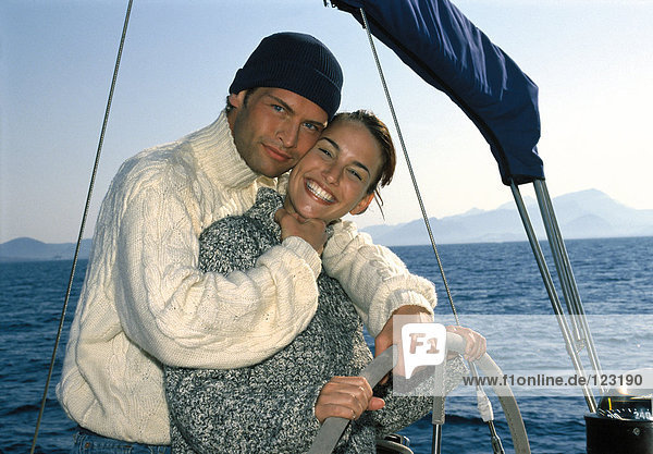 Couple on sailing boat
