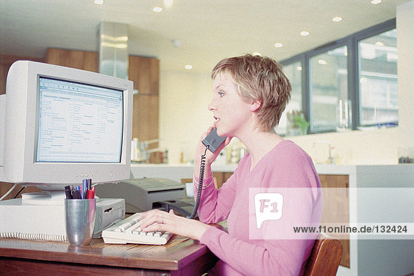 Businesswoman on telephone in office