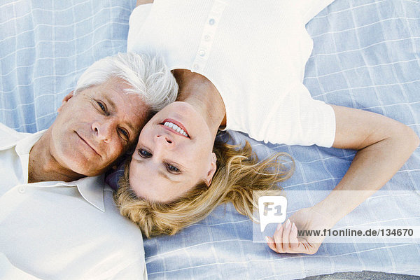 Couple lying down together