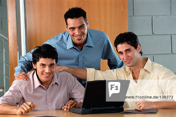 Businessmen with laptop computer