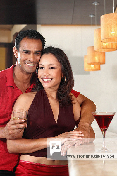 Smiling couple in bar