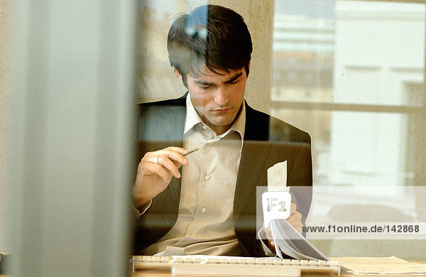 Businessman reading document