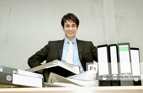 Businessman with messy desk