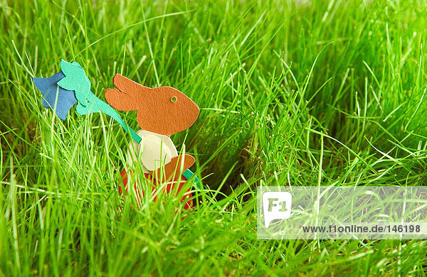 Easter bunny running in grass