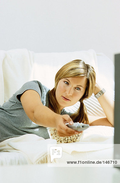 Woman in front of television