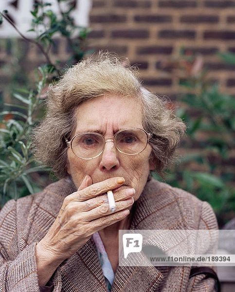 Elderly woman smoking