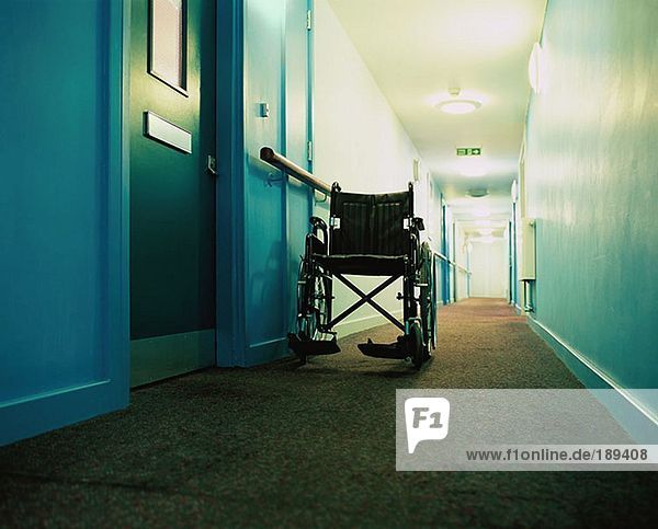 Wheelchair in a corridor