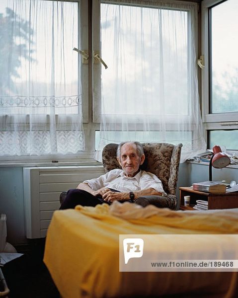Elderly man in his room