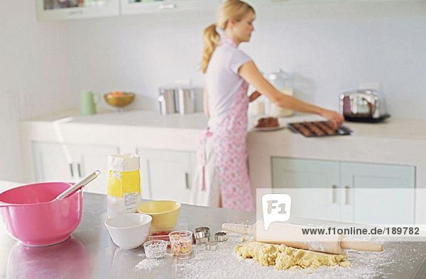 Woman baking in kitchen