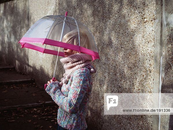 Woman with transparent umbrella