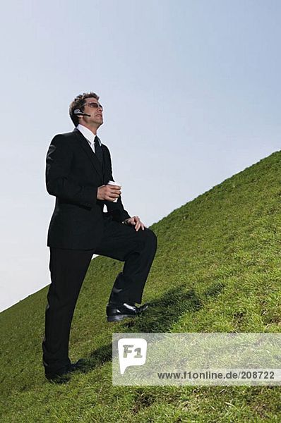 Businessman on steep hill