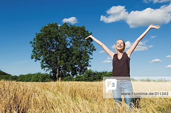 Happy woman in a field