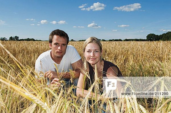Couple in a field of wheat