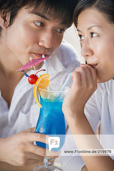 Couple drinking cocktail