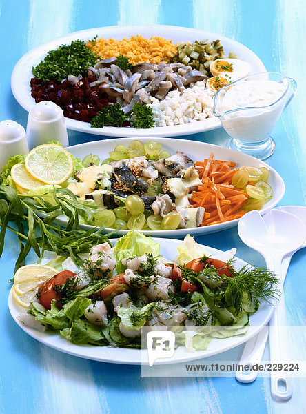 Drei verschiedene Fischsalate