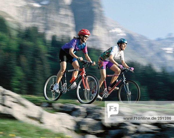 10192290  alp  Alps  Switzerland  Europe  mountains  bicycle  bike  biking  mountains  helmet  mountain bike  sport  pair  cou