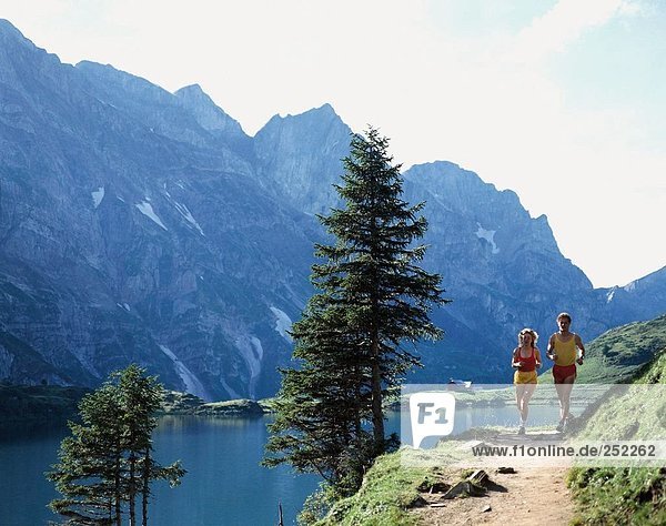 10126960  mountain landscape  angel's mountain  jogger  jogging  sport  canton Obwalden  lake  sea  mountains  alpine  Alps  s