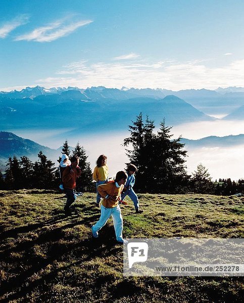 10134085  alpine  Alps  mountains  mountain panorama  mountain walking  family  sea of fog  Rigi  walking  hiking  meadow  Swi