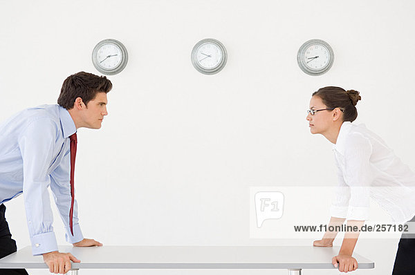 Businessman and businesswoman in an argument