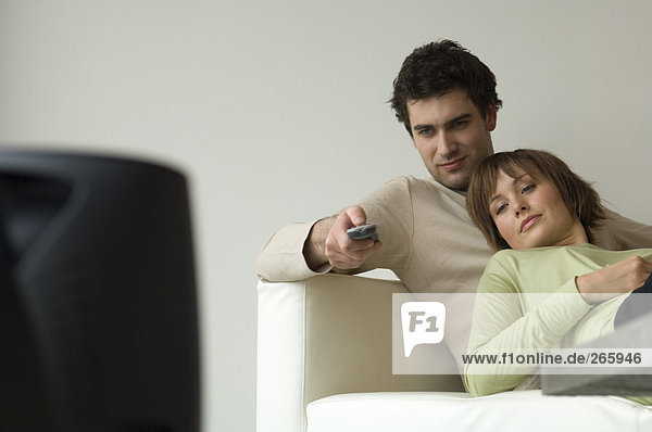 Couple at home  watching TV