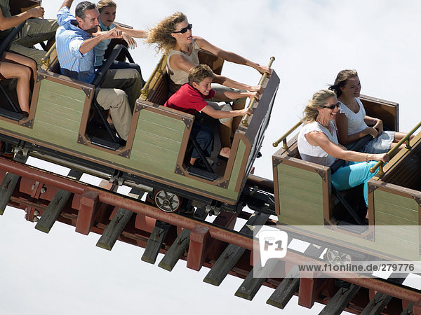 People on a roller coaster