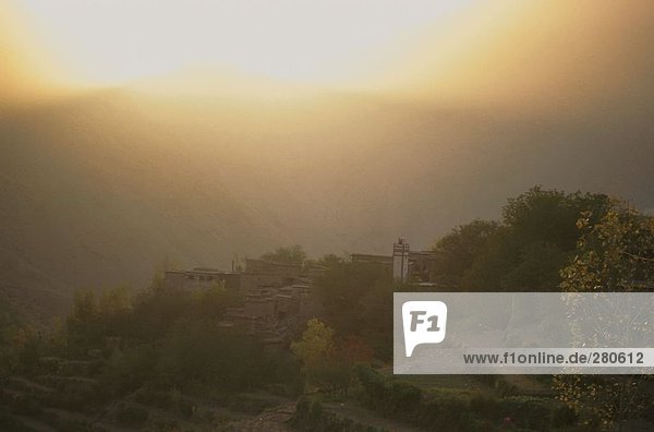 Houses on hill at dusk Morocco