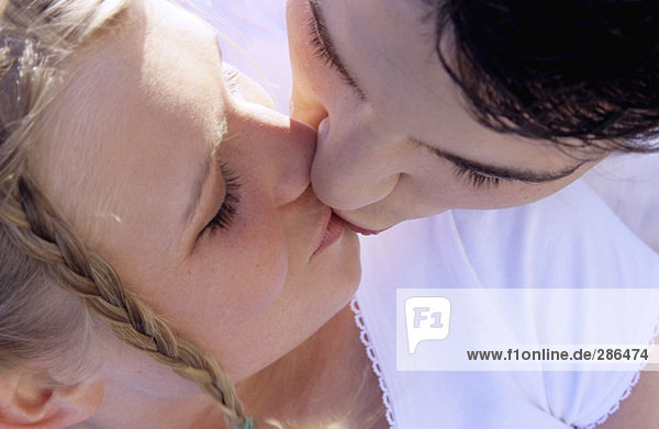 Young couple kissing  close-up