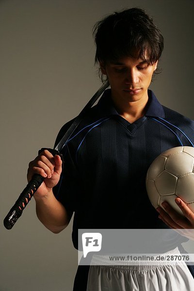 Soccer player with Japanese sword