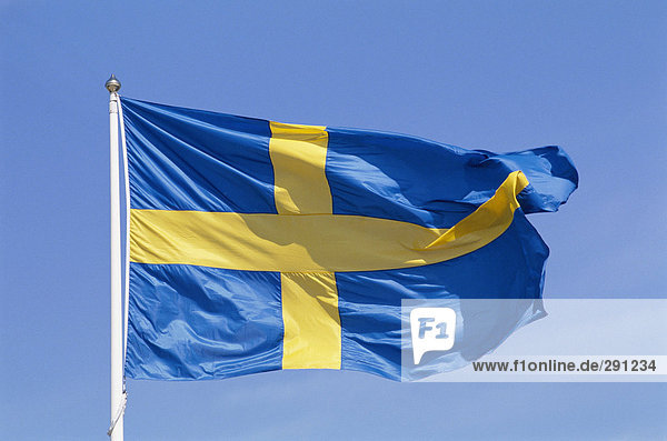 Eine schwedische Flagge blowing in the Wind.