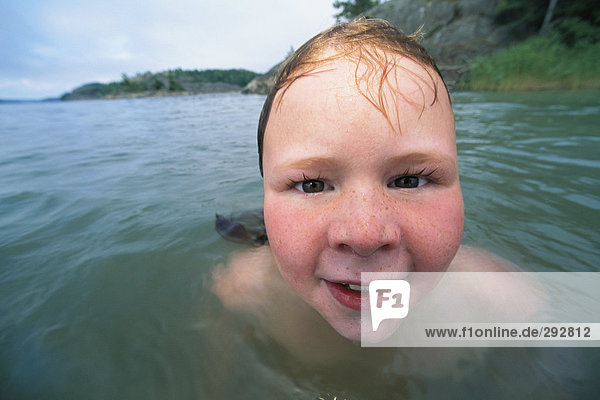 Portrait of a girl in water.