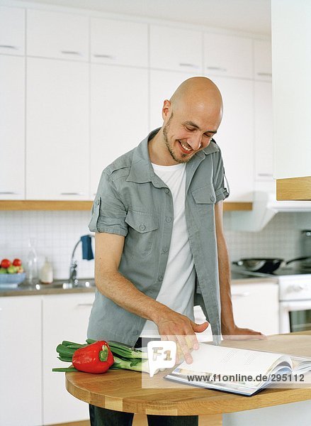 A man in a kitchen.