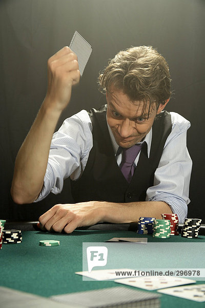 A man playing poker.