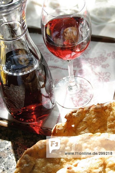 Close-up of bottle and glass of red wine